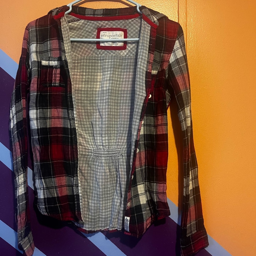 Brand is aéropostale red flannel size extra small good condition